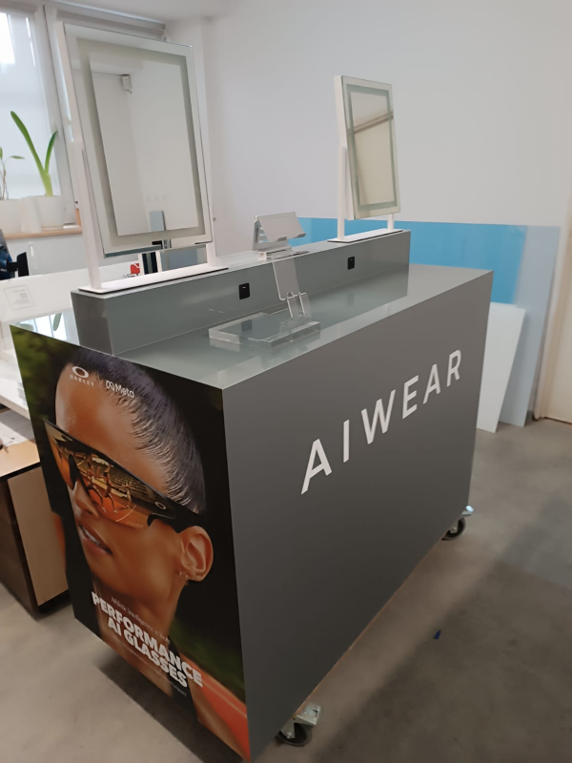 Permanent eyewear retail display designed with replaceable branded graphic panels and durable construction.